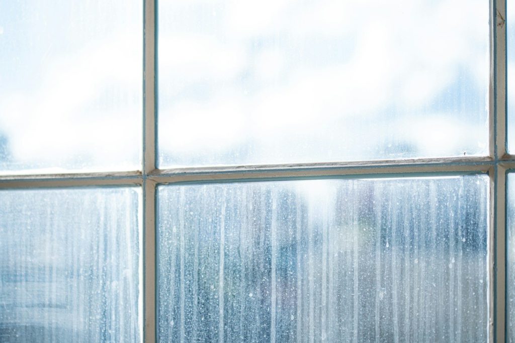 professional-window-cleaning-cape-town-technician-cleaning-office-windows